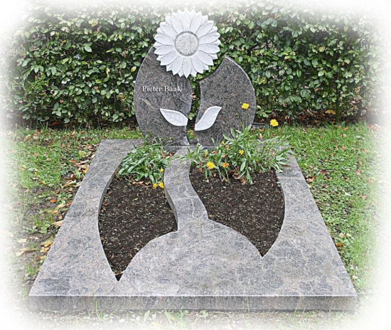 dubbel grafmonument met een zonnebloem